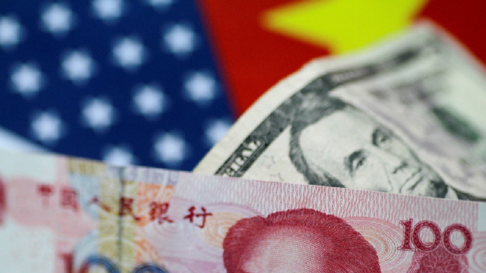 NEGOCIOS / CONTRAGOLPE COMERCIAL: CHINA LE RESPONDE A TRUMP DEVALUANDO SU MONEDA NACIONAL