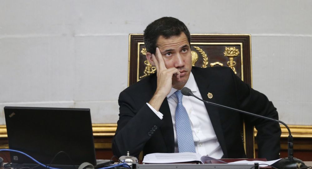  Un magistrado venezolano afirma que opositor Guaidó debe ser apresado al regresar al país